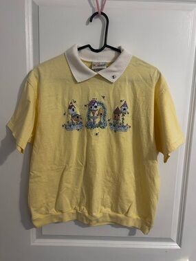 Women’s Short-Sleeve Yellow Polo Tee with Embroidered Birdhouse Motif